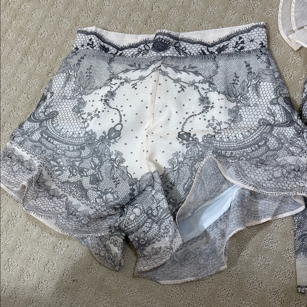 Elegant Black and White Lace Blouse and Shorts - Picture 7 of 7